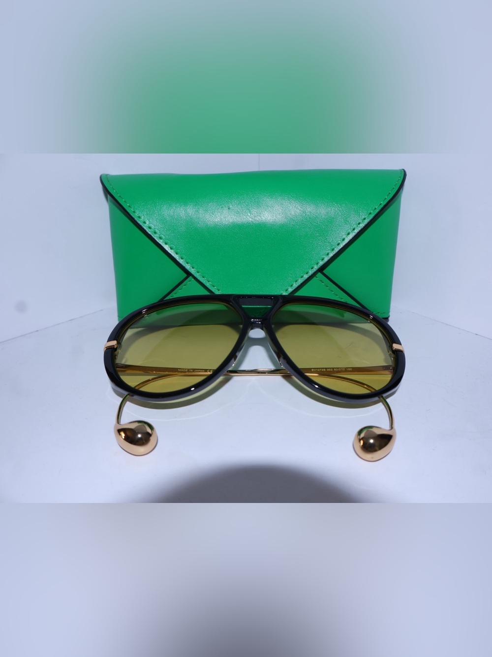 Women’s Green Envelope Sunglasses Case with Black/Gold Sunglasses